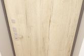 Входная дверь Гардиан в интерьере с отделкой Матрикс ПЛ 00